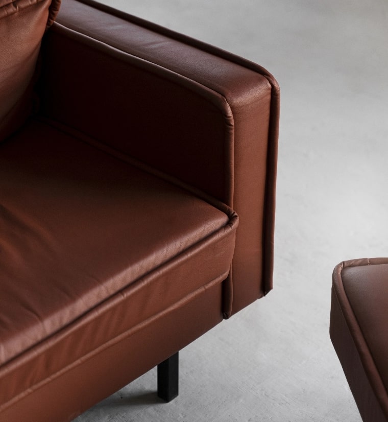 Close-up of a modern brown leather sofa