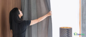 Curtain being taken down for cleaning and maintenance